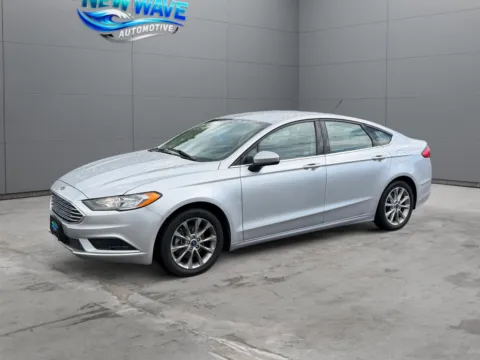 Silver 2017 Ford Fusion Hybrid SE for sale in Denver, CO