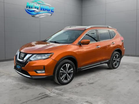 Orange 2017 Nissan Rogue SL for sale in Denver, CO