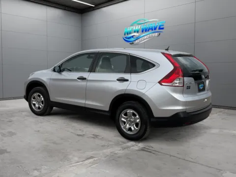 Another view of 2014 Honda CR-V LX for sale in Denver, CO at New Wave Automotive