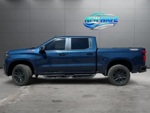 Photos of 2021 Chevrolet Silverado 1500 4WD Crew Cab Short Bed LT Trail Boss for sale in Denver, CO at New Wave Automotive