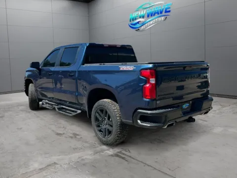 Another view of 2021 Chevrolet Silverado 1500 4WD Crew Cab Short Bed LT Trail Boss for sale in Denver, CO at New Wave Automotive
