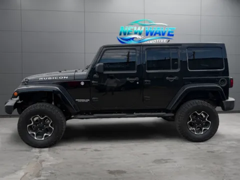 Photos of 2014 Jeep Wrangler Unlimited Rubicon for sale in Denver, CO at New Wave Automotive
