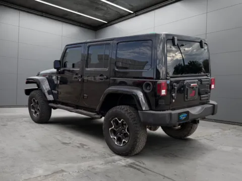 Another view of 2014 Jeep Wrangler Unlimited Rubicon for sale in Denver, CO at New Wave Automotive