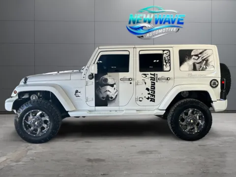 Photos of 2015 Jeep Wrangler Unlimited Sahara for sale in Denver, CO at New Wave Automotive