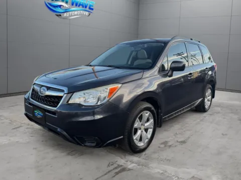 Gray 2015 Subaru Forester 2.5i Premium for sale in Denver, CO