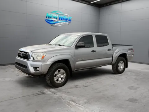 Silver 2014 Toyota Tacoma Base V6 for sale in Denver, CO