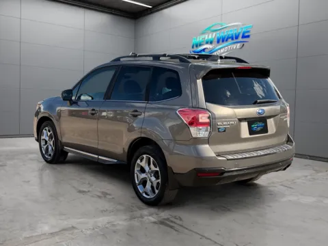 Another view of 2017 Subaru Forester 2.5i Touring for sale in Denver, CO at New Wave Automotive