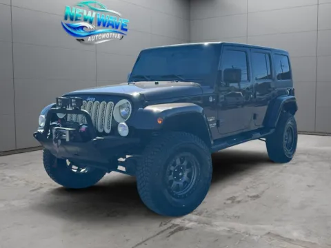 Brown 2013 Jeep Wrangler Unlimited Sahara for sale in Denver, CO