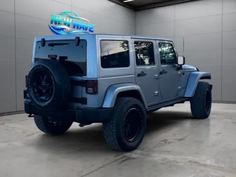 More photos of 2015 Jeep Wrangler Unlimited Altitude at New Wave Automotive, CO