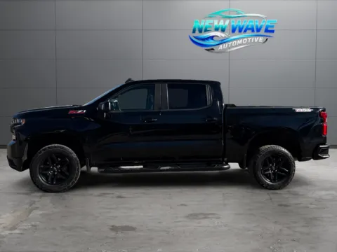 Photos of 2021 Chevrolet Silverado 1500 4WD Crew Cab Short Bed LT Trail Boss for sale in Denver, CO at New Wave Automotive