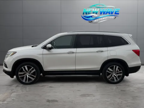 Photos of 2017 Honda Pilot Touring for sale in Denver, CO at New Wave Automotive