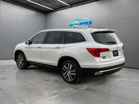 Another view of 2017 Honda Pilot Touring for sale in Denver, CO at New Wave Automotive
