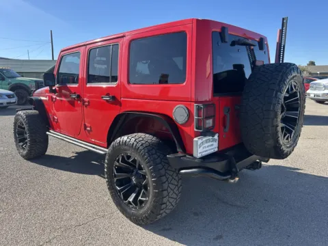 Another view of 2017 JEEP WRANGLER UNLIMI SAHARA for sale in Alamogordo, NM at Justin's Motor Company