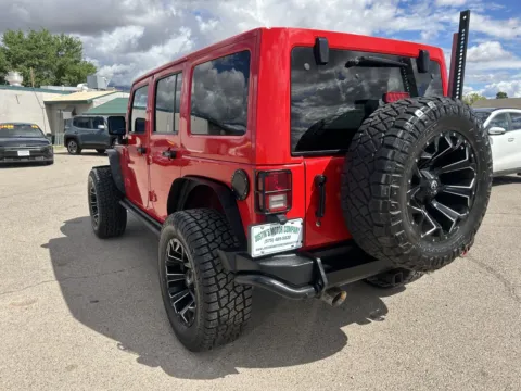 Another view of 2017 JEEP WRANGLER UNLIMI SAHARA for sale in Alamogordo, NM at Justin's Motor Company