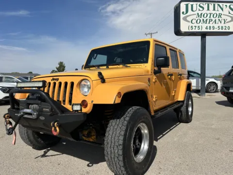 Yellow 2012 JEEP WRANGLER UNLIMI SAHARA for sale in Alamogordo, NM