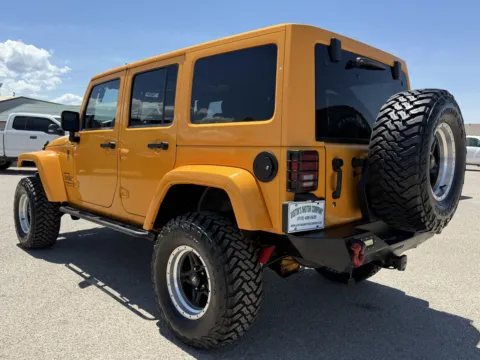 Another view of 2012 JEEP WRANGLER UNLIMI SAHARA for sale in Alamogordo, NM at Justin's Motor Company