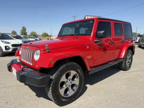 Red 2018 JEEP WRANGLER UNLIMI SAHARA for sale in Alamogordo, NM
