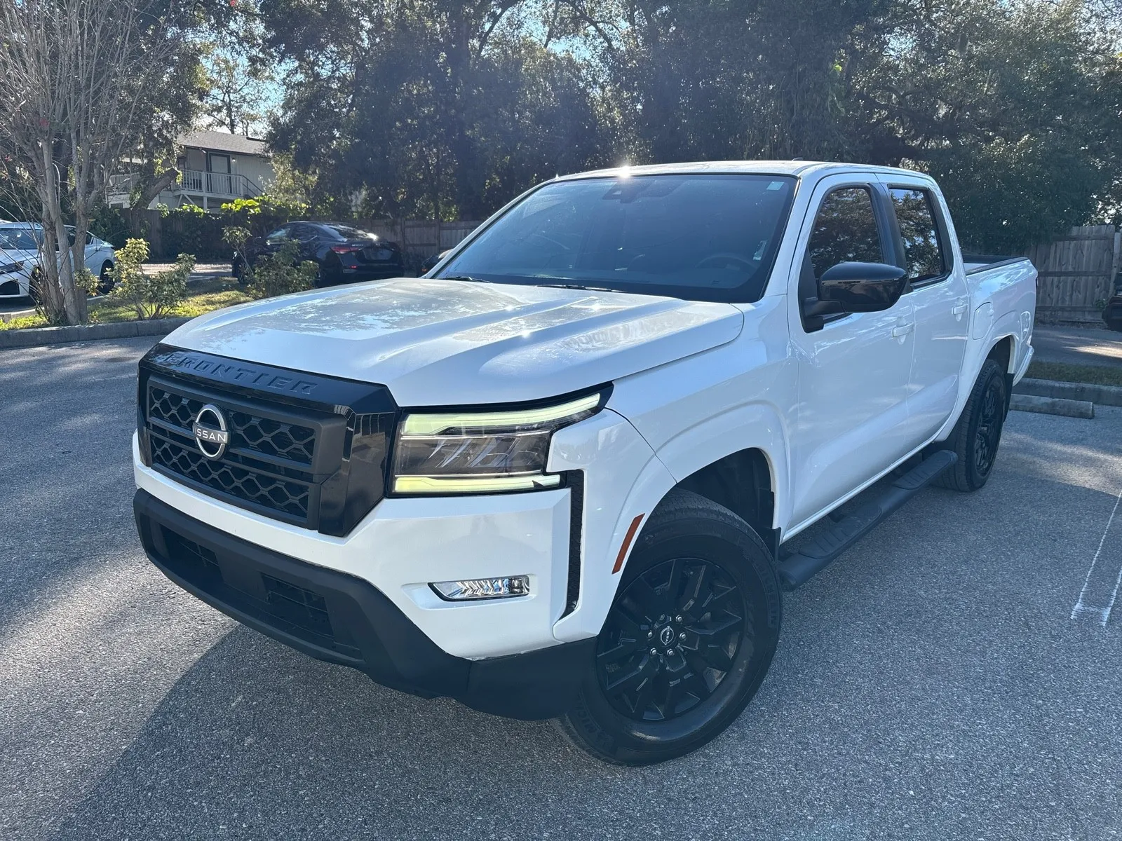 Silver 2023 Nissan Frontier SV Crew Cab V6 w/TECH & MIDNIGHT PKG. for sale in Seffner, FL