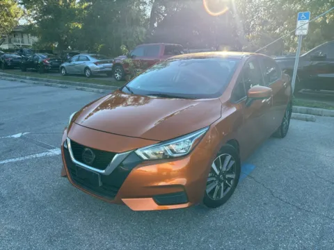Orange 2020 Nissan Versa SV for sale in Seffner, FL