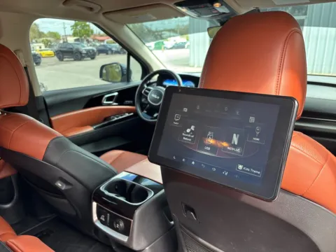 Photos of 2023 Kia Carnival SX W/REAR SEAT ENTERTAINMENT for sale in Seffner, FL at Evo Motors