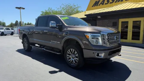 Photos of 2016 Nissan TITAN XD Crew Cab Platinum Reserve Pickup 4D 6 1/2 ft for sale in Boise, ID at MASS Motors Fairview Used Car Dealership