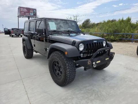 Another view of 2016 JEEP WRANGLER UNLIMI SPORT for sale in Fort Worth, TX at Callahan Motor Company