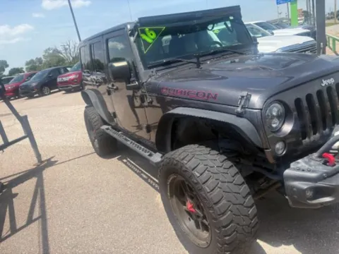 Gray 2016 Jeep Wrangler Unlimited Rubicon Hard Rock for sale in Wichita, KS
