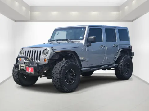 Another view of 2013 Jeep Wrangler Unlimited Sahara for sale in Bonham, TX at Bonham Chrysler