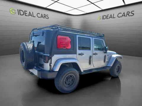 More photos of 2014 Jeep Wrangler Unlimited Sahara at Ideal Cars - Main Street, AZ