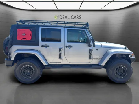 More photos of 2014 Jeep Wrangler Unlimited Sahara at Ideal Cars - Main Street, AZ