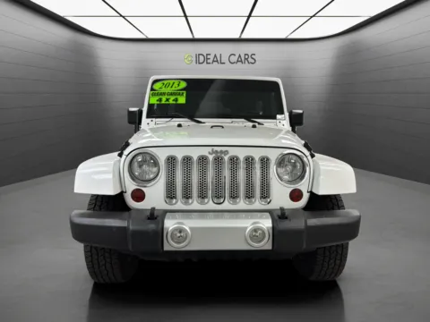 Photos of 2013 Jeep Wrangler Unlimited Sahara for sale in Mesa, AZ at Ideal Cars - Main Street