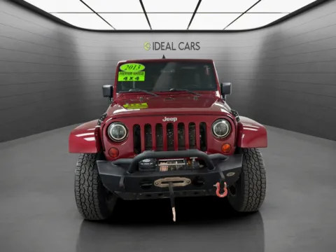 Photos of 2013 Jeep Wrangler Unlimited Sahara for sale in Mesa, AZ at Ideal Cars - Main Street