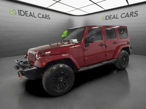 Red 2013 Jeep Wrangler Unlimited Sahara for sale in Mesa, AZ
