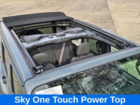 Another view of 2025 Jeep Wrangler Sahara 4xe w/Sky One Touch Power Top for sale in Concord, NC at Carolina Auto Warehouse