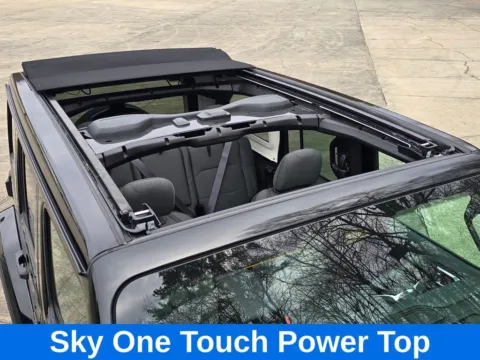 Another view of 2025 Jeep Wrangler Sahara 4xe w/Sky One Touch Power Top for sale in Concord, NC at Carolina Auto Warehouse