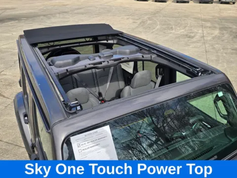 Another view of 2025 Jeep Wrangler Sahara 4xe W/Sky One Touch Power Roof for sale in Concord, NC at Carolina Auto Warehouse