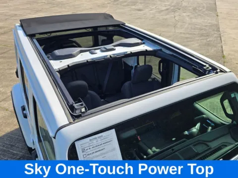 Another view of 2025 Jeep Wrangler Sahara 4xe w/Sky One Touch Power Top for sale in Concord, NC at Carolina Auto Warehouse