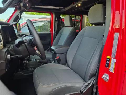 Photos of 2025 Jeep Wrangler Sahara 4xe w/Sky One Touch Power Top for sale in Concord, NC at Carolina Auto Warehouse