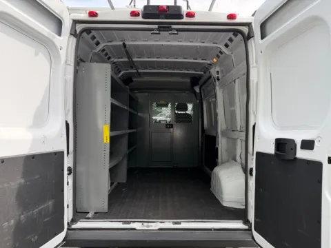 Another view of 2025 Ram ProMaster 2500 High Roof 136WB w/Ladder Rack, Bulkhead, and Shelves for sale in Concord, NC at Carolina Auto Warehouse