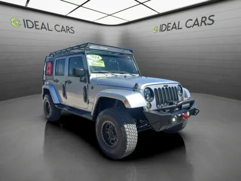 Another view of 2014 Jeep Wrangler Unlimited Sahara for sale in Mesa, AZ at Ideal Cars - East Mesa (Hill)