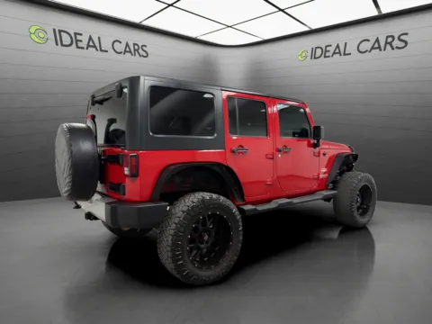 More photos of 2011 Jeep Wrangler Unlimited Sahara at Ideal Cars - East Mesa (Hill), AZ