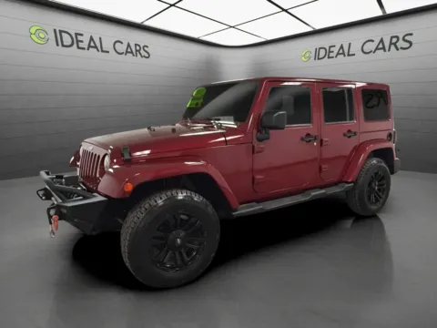Red 2013 Jeep Wrangler Unlimited Sahara for sale in Apache Junction, AZ