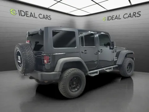 More photos of 2011 Jeep Wrangler Unlimited Sport at Ideal Cars - at Crismon Rd., AZ