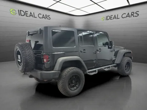 More photos of 2011 Jeep Wrangler Unlimited Sport at Ideal Cars - at Crismon Rd., AZ