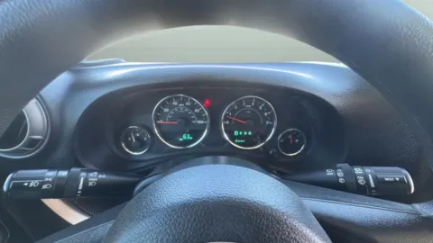 More photos of 2015 Jeep Wrangler Sport at Ideal Cars - at Gilbert Rd, AZ