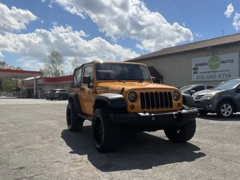 Orange 2012 Jeep Wrangler Sport for sale in Columbus, IN