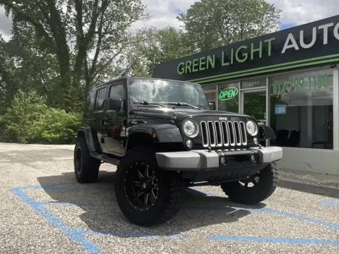 Photos of 2017 Jeep Wrangler Unlimited Sahara for sale in Columbus, IN at Green Light Auto - Jonesville Road