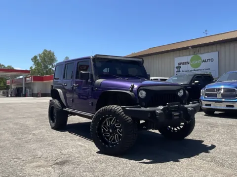 Photos of 2017 Jeep Wrangler Unlimited Sahara for sale in Columbus, IN at Green Light Auto - Jonesville Road