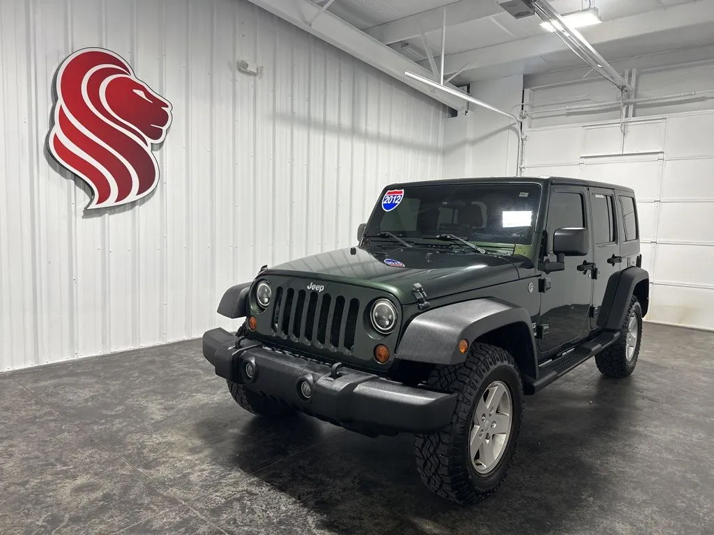 Green 2012 Jeep Wrangler Unlimited Sport for sale in Evansville, IN