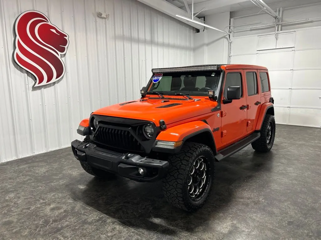 Orange 2019 Jeep Wrangler Unlimited Sahara for sale in Evansville, IN
